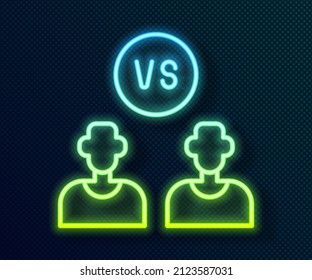 Glowing neon line Football or soccer player icon isolated on black background.  Vector