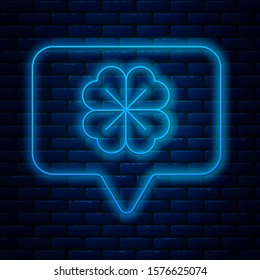 Glowing neon line Four leaf clover in speech bubble icon isolated on brick wall background. Happy Saint Patrick day.  Vector Illustration