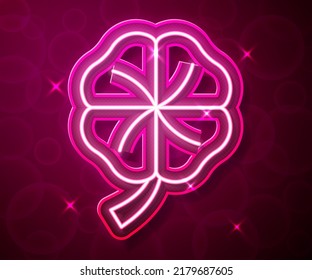 Glowing neon line Four leaf clover icon isolated on red background. Happy Saint Patricks day. National Irish holiday.  Vector