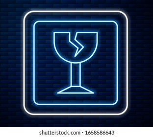 Glowing neon line Fragile broken glass symbol for delivery boxes icon isolated on brick wall background.  Vector Illustration