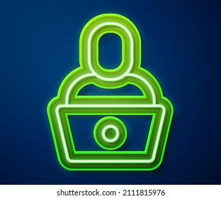 Glowing neon line Freelancer icon isolated on blue background. Freelancer man working on laptop at his house. Online working, distant job concept.  Vector