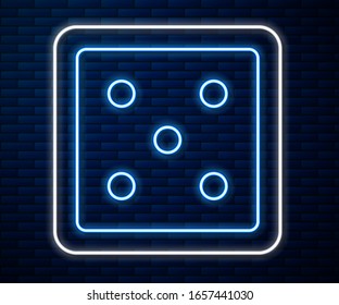 Glowing neon line Game dice icon isolated on brick wall background. Casino gambling.  Vector Illustration