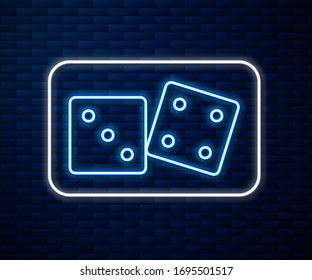 Glowing neon line Game dice icon isolated on brick wall background. Casino gambling.  Vector Illustration