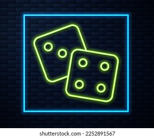 Glowing neon line Game dice icon isolated on brick wall background. Casino gambling.  Vector