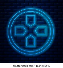 Glowing neon line Gamepad icon isolated on brick wall background. Game controller.  Vector Illustration