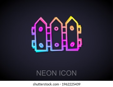Glowing neon line Garden fence wooden icon isolated on black background. Vector