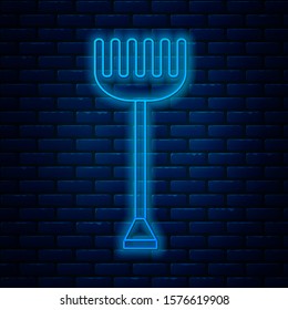 Glowing neon line Garden rake icon isolated on brick wall background. Tool for horticulture, agriculture, farming. Ground cultivator. Housekeeping equipment.  Vector Illustration