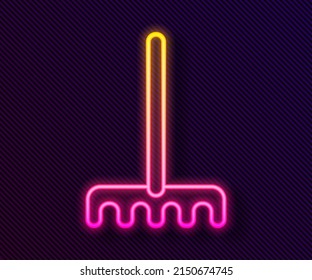 Glowing neon line Garden rake icon isolated on black background. Tool for horticulture, agriculture, farming. Ground cultivator. Housekeeping equipment.  Vector