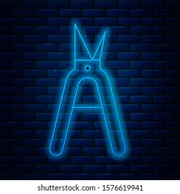 Glowing neon line Gardening handmade scissors for trimming icon isolated on brick wall background. Pruning shears with wooden handles.  Vector Illustration