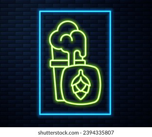 Glowing neon line Glass of beer icon isolated on brick wall background.  Vector
