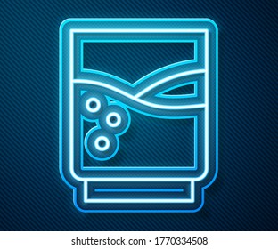 Glowing neon line Glass with water icon isolated on blue background. Soda glass.  Vector Illustration
