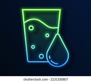 Glowing neon line Glass with water icon isolated on blue background. Soda glass.  Vector