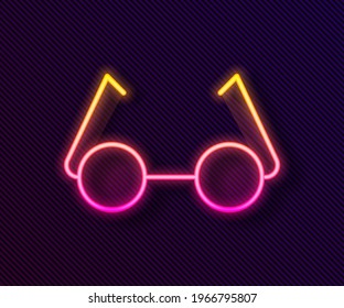 Glowing neon line Glasses icon isolated on black background. Eyeglass frame symbol.  Vector Illustration