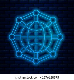 Glowing neon line Global technology or social network icon isolated on brick wall background.  Vector Illustration