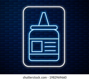 Glowing neon line Glue icon isolated on brick wall background.  Vector Illustration