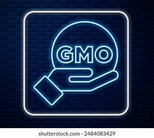 Glowing neon line GMO icon isolated on brick wall background. Genetically modified organism acronym. Dna food modification.  Vector