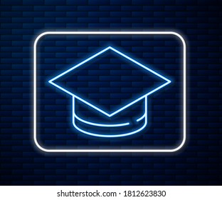 Glowing neon line Graduation cap icon isolated on brick wall background. Graduation hat with tassel icon.  Vector