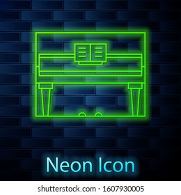 Glowing neon line Grand piano icon isolated on brick wall background. Musical instrument.  Vector Illustration