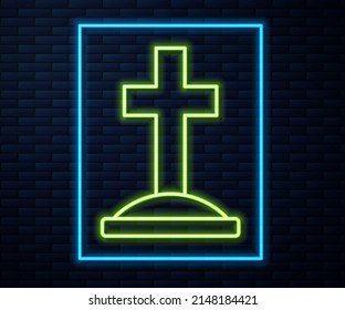 Glowing neon line Grave with cross icon isolated on brick wall background.  Vector