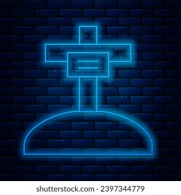 Glowing neon line Grave with cross icon isolated on brick wall background.  Vector