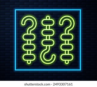Glowing neon line Grilled shish kebab on skewer stick icon isolated on brick wall background. Meat kebab on skewer stick. Picnic with grilled meat.  Vector