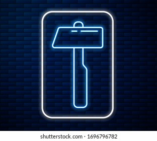 Glowing neon line Hammer icon isolated on brick wall background. Tool for repair.  Vector Illustration