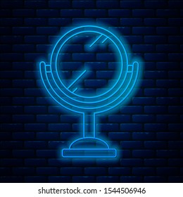 Glowing neon line Hand mirror icon isolated on brick wall background.  Vector Illustration