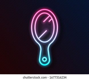 Glowing neon line Hand mirror icon isolated on black background.  Vector Illustration
