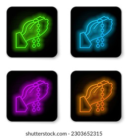 Glowing neon line Hands in praying position with rosary icon isolated on white background. Praying hand islam muslim religion spirituality religious. Black square button. Vector