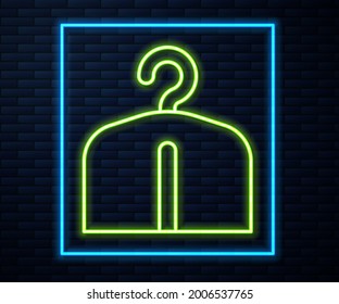 Glowing neon line Hanger wardrobe icon isolated on brick wall background. Cloakroom icon. Clothes service symbol. Laundry hanger sign.  Vector