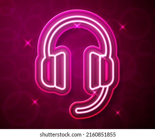 Glowing neon line Headphones icon isolated on red background. Earphones. Concept for listening to music, service, communication and operator.  Vector