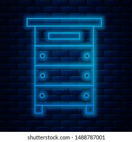 Glowing neon line Hive for bees icon isolated on brick wall background. Beehive symbol. Apiary and beekeeping. Sweet natural food.  Vector Illustration