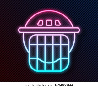 Glowing neon line Hockey helmet icon isolated on black background.  Vector Illustration