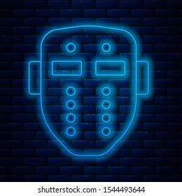 Glowing neon line Hockey mask icon isolated on brick wall background. Happy Halloween party.  Vector Illustration