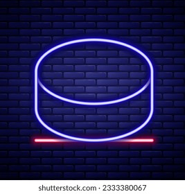 Glowing neon line Hockey puck icon isolated on brick wall background. Colorful outline concept. Vector