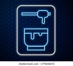 Glowing neon line Honey dipper stick and bowl icon isolated on brick wall background. Honey ladle.  Vector Illustration