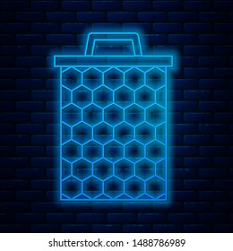 Glowing neon line Honeycomb icon isolated on brick wall background. Honey cells symbol. Sweet natural food.  Vector Illustration
