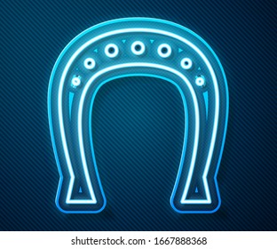 Glowing neon line Horseshoe icon isolated on blue background.  Vector Illustration
