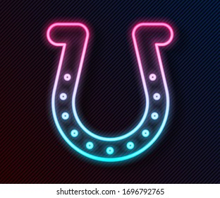 Glowing neon line Horseshoe icon isolated on black background.  Vector Illustration