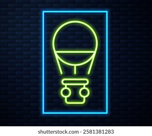 Glowing neon line Hot air balloon icon isolated on brick wall background. Air transport for travel.  Vector