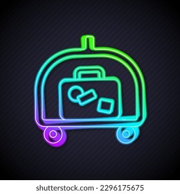 Glowing neon line Hotel luggage cart with suitcase icon isolated on black background. Traveling baggage sign. Travel luggage icon.  Vector