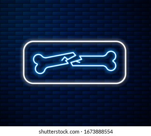 Glowing neon line Human broken bone icon isolated on brick wall background.  Vector Illustration