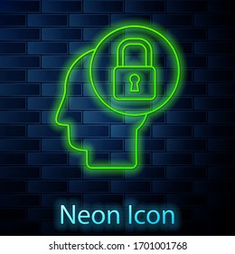 Glowing neon line Human head with lock icon isolated on brick wall background. Vector Illustration