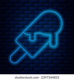 Glowing neon line Ice cream icon isolated on brick wall background. Sweet symbol.  Vector