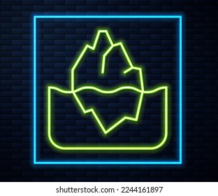 Glowing neon line Iceberg icon isolated on brick wall background.  Vector
