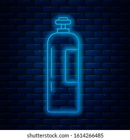 Glowing neon line Industrial gas cylinder tank for all inert and mixed inert gases icon isolated on brick wall background.  Vector Illustration