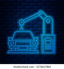 Glowing neon line Industrial machine robotic robot arm hand on car factory icon isolated on brick wall background. Industrial automation production automobile.  Vector Illustration