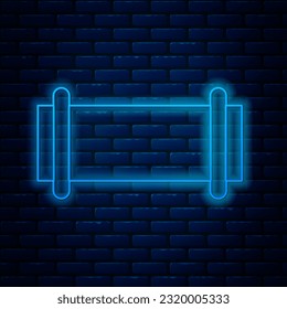 Glowing neon line Industry metallic pipe icon isolated on brick wall background.  Vector Illustration