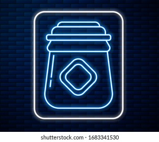 Glowing neon line Jar of honey icon isolated on brick wall background. Food bank. Sweet natural food symbol.  Vector Illustration