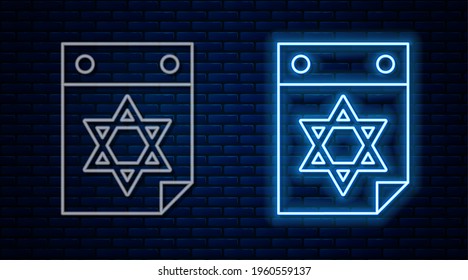 Glowing neon line Jewish calendar with star of david icon isolated on brick wall background. Hanukkah calendar day. Vector